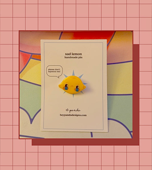 sad lemon (resin pin)